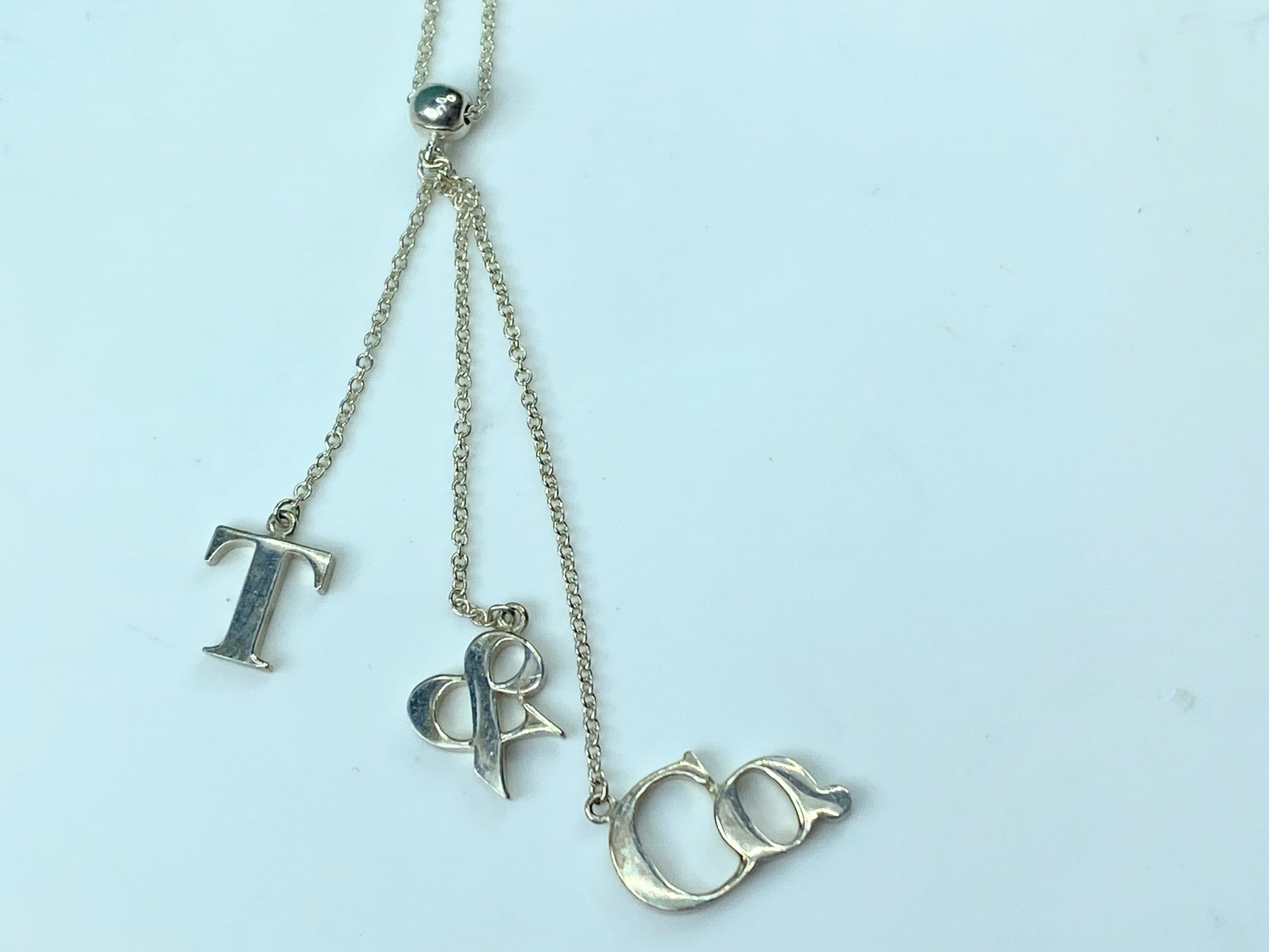 Tiffany & Co. Sterling Silver Logo Drop Pendant Necklace JR342