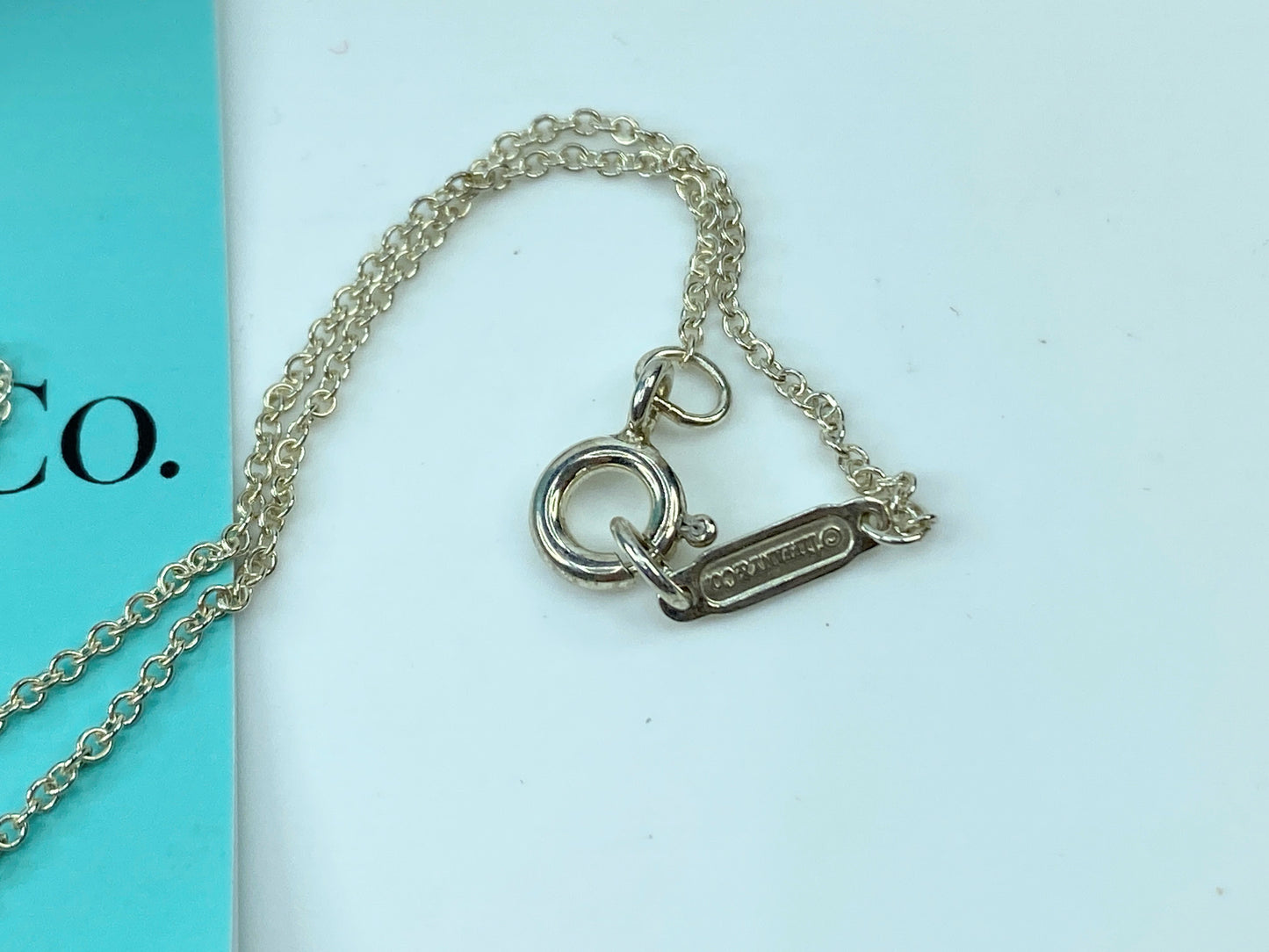 Tiffany & Co. Sterling Silver Logo Drop Pendant Necklace JR342