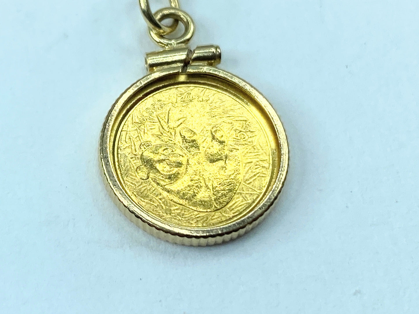 2000's 1/20th oz Panda Gold coin in 14K bezel 2.4g JR9175