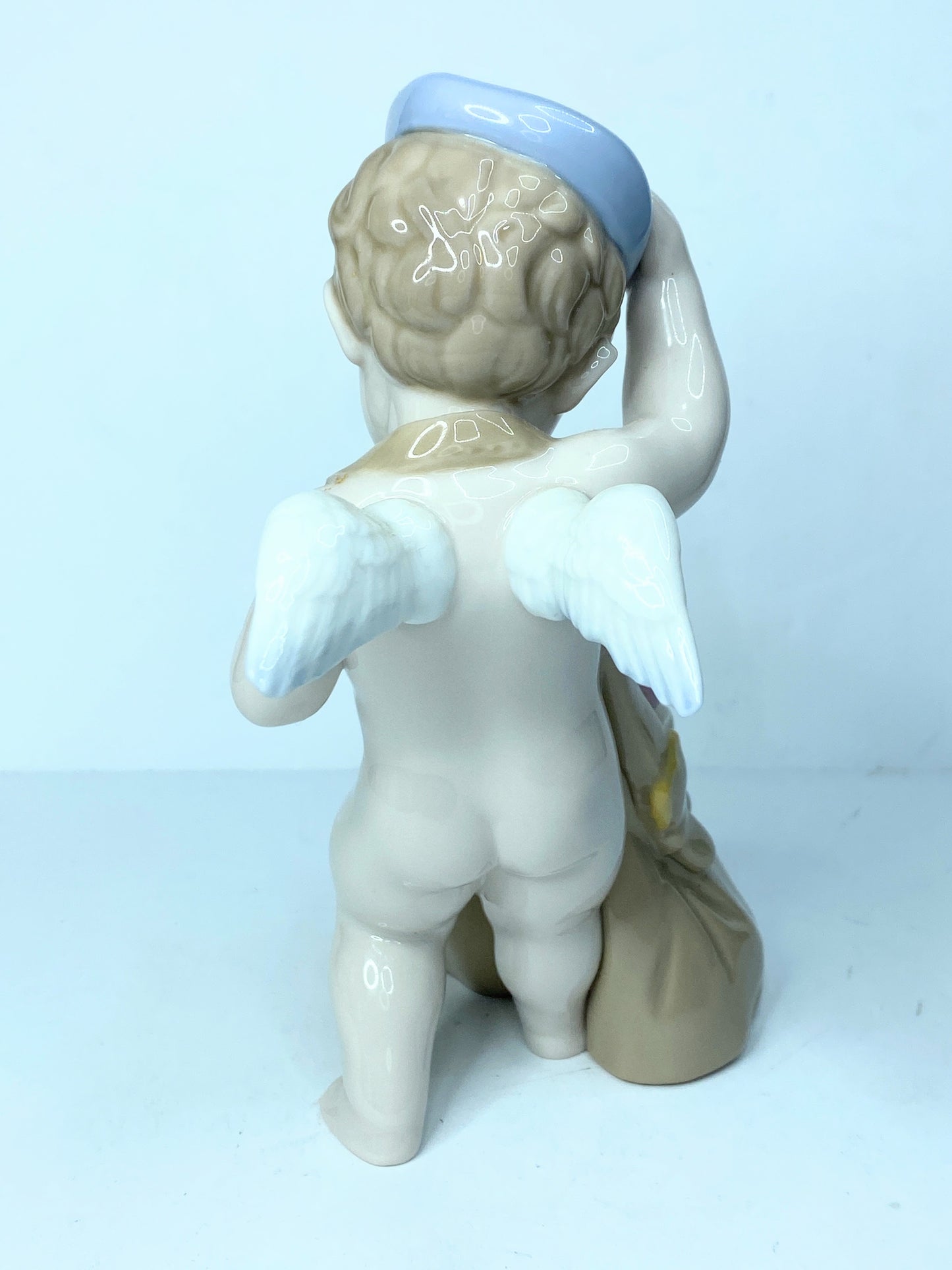 Lladro Love Letters Cupid Figurine In Blue Cap With Sack of Pink Hearts A119