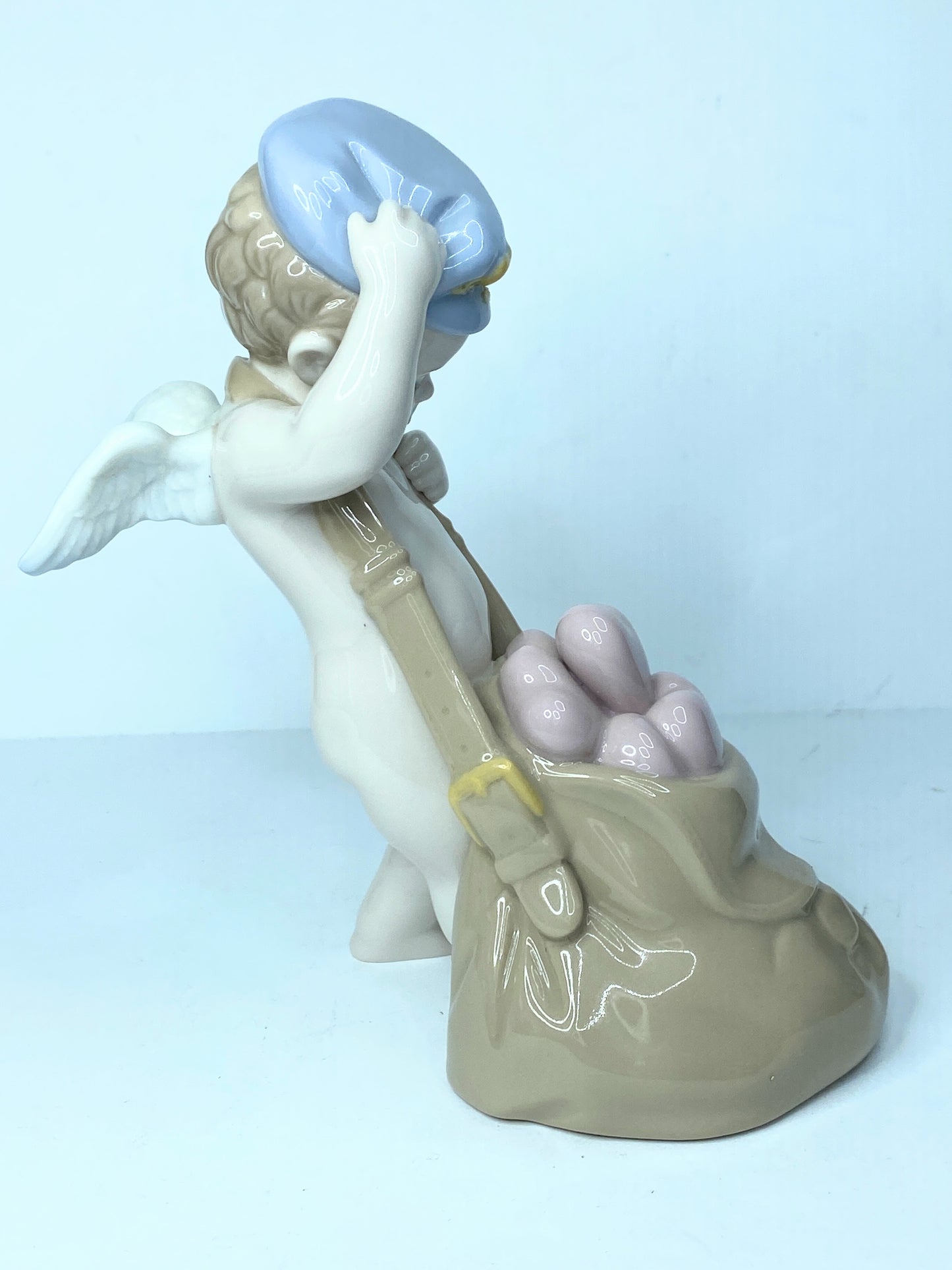 Lladro Love Letters Cupid Figurine In Blue Cap With Sack of Pink Hearts A119