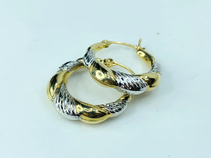 Ornate 10K two tone gold texture smooth dangle hoop earrings. 1.8g JR1005