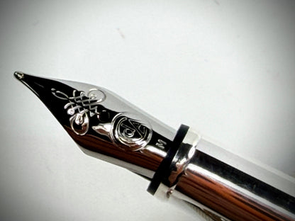 vintage caran d’ache swiss silver plate fountain pen engine turned style ss305