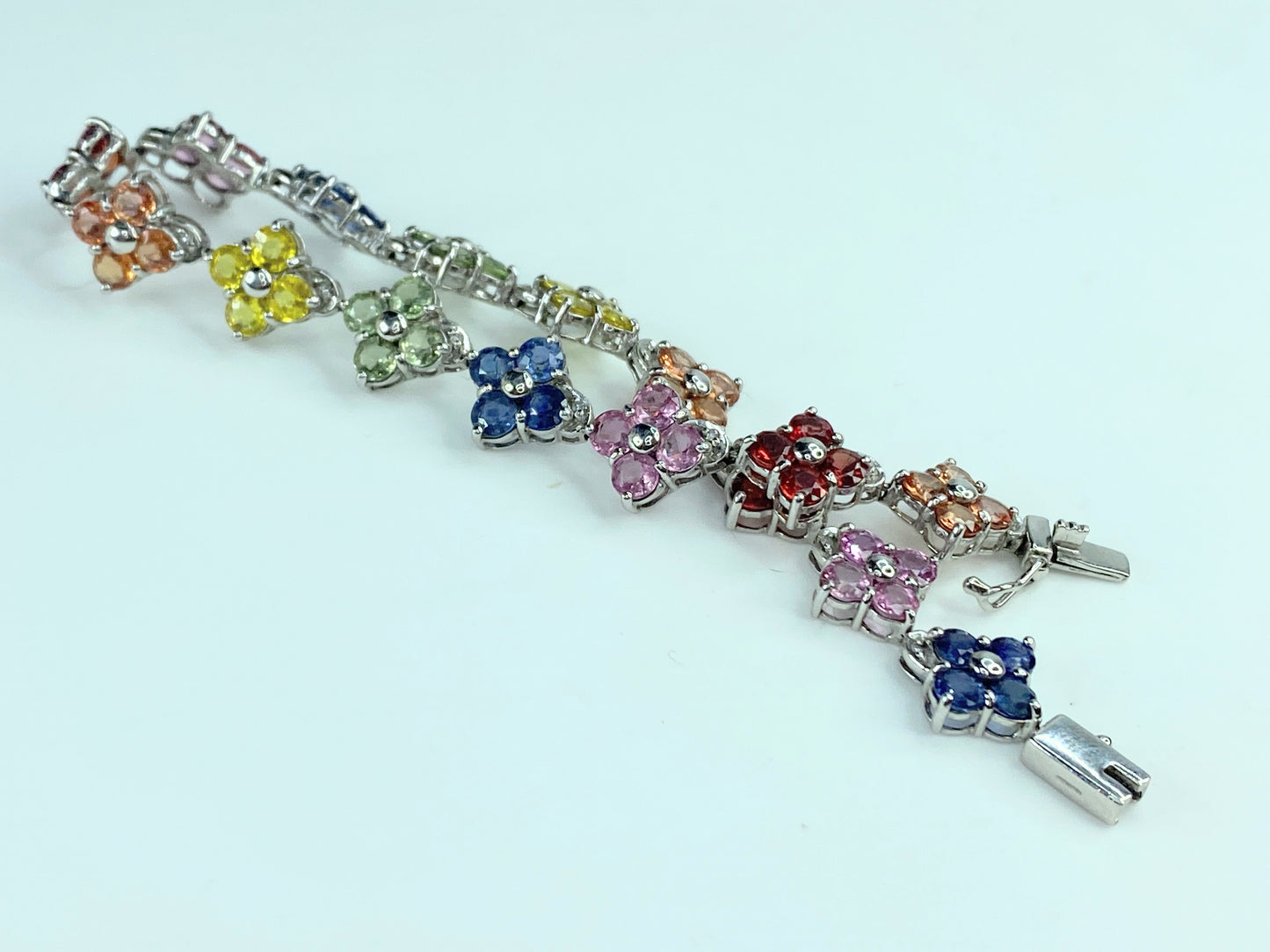 Birmingham Hallmark 9ct Vari Hue Sapphire quatrefoil gems bracelet 7.25" JR9966