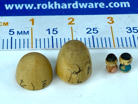 Rare miniature 4.5mm tall pair of Kokeshi in wood egg shell case 14mm A22