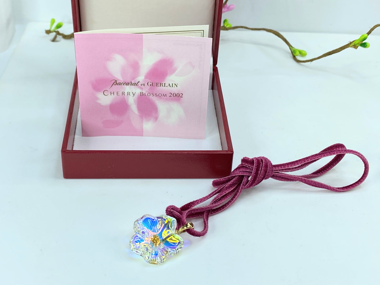 Baccarat 18K 750 Cherry Blossom crystal pendant in burgundy velvet cord JR1087