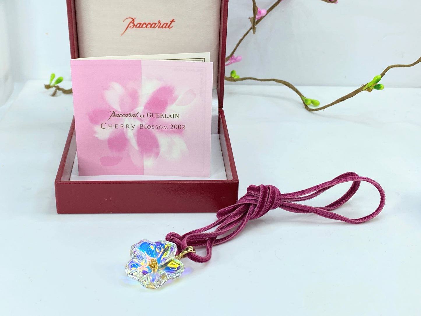 Baccarat 18K 750 Cherry Blossom crystal pendant in burgundy velvet cord JR1087