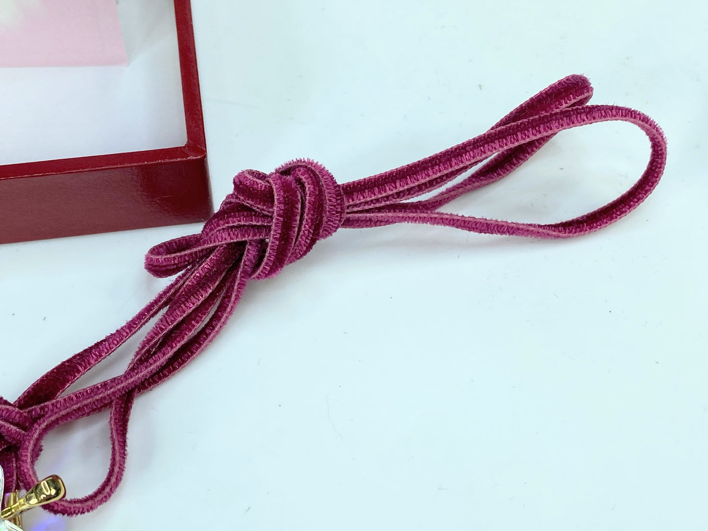 Baccarat 18K 750 Cherry Blossom crystal pendant in burgundy velvet cord JR1087