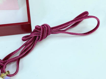 Baccarat 18K 750 Cherry Blossom crystal pendant in burgundy velvet cord JR1087