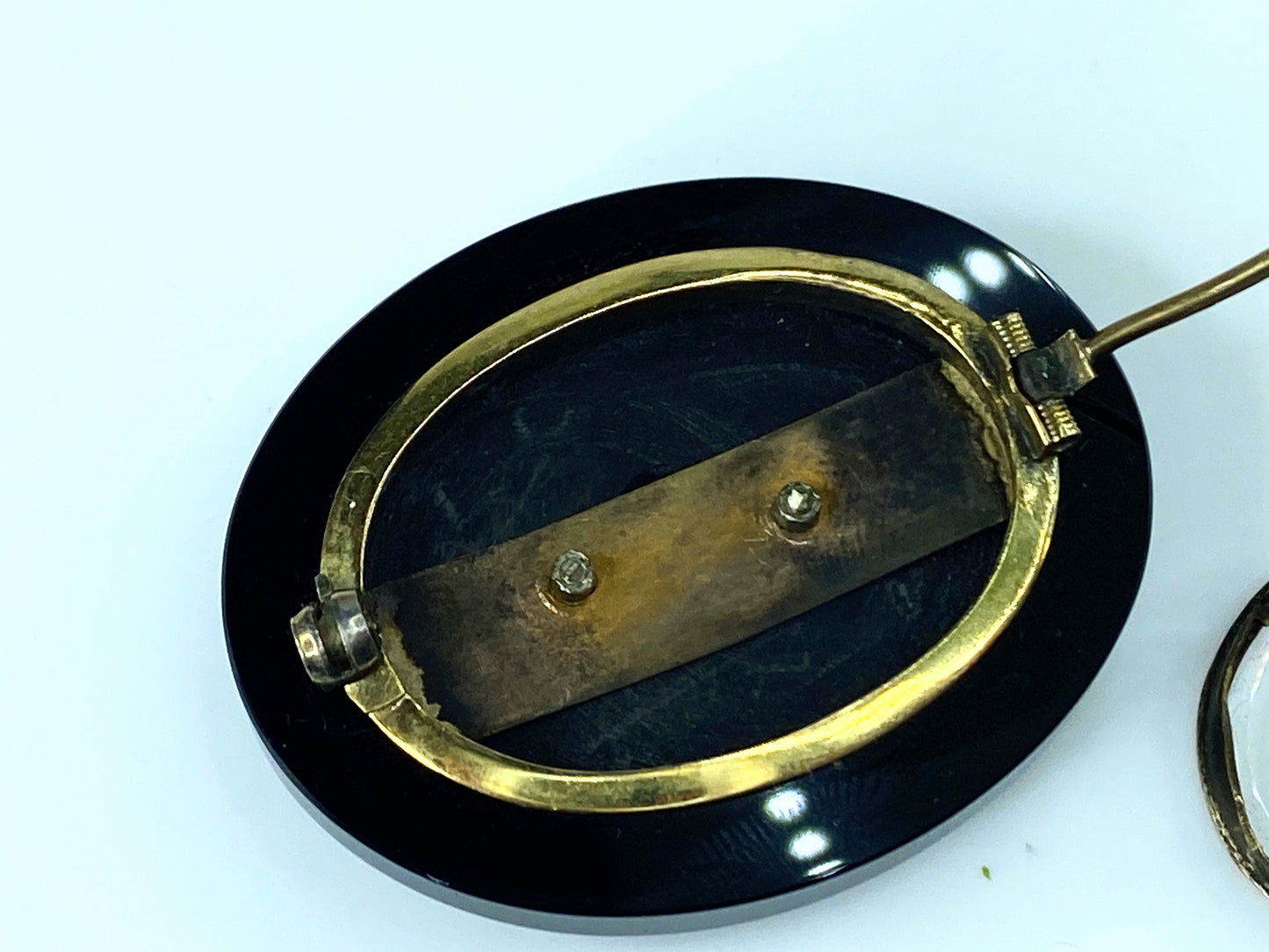 Early 20th century 10k Onyx seed pearls Mourning brooch glazed panel compartment Reverse JR0005