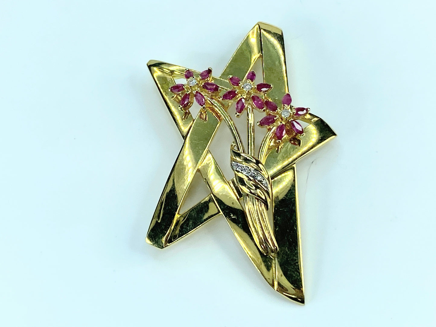 Tiffany & Co. Paloma Picasso Ruby Diamond Star brooch in 18K gold JR9244