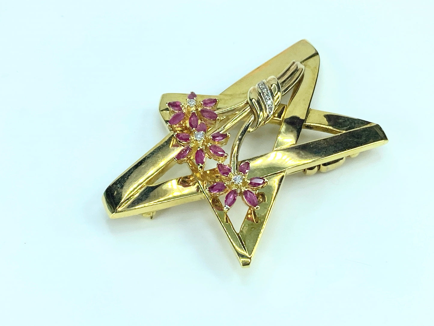 Tiffany & Co. Paloma Picasso Ruby Diamond Star brooch in 18K gold JR9244