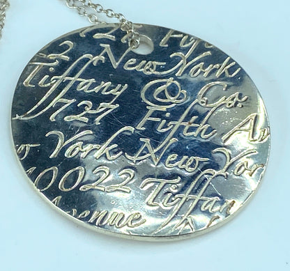 Tiffany & Co. Notes 727 Fifth Avenue New York Round Pendant Necklace JR9300