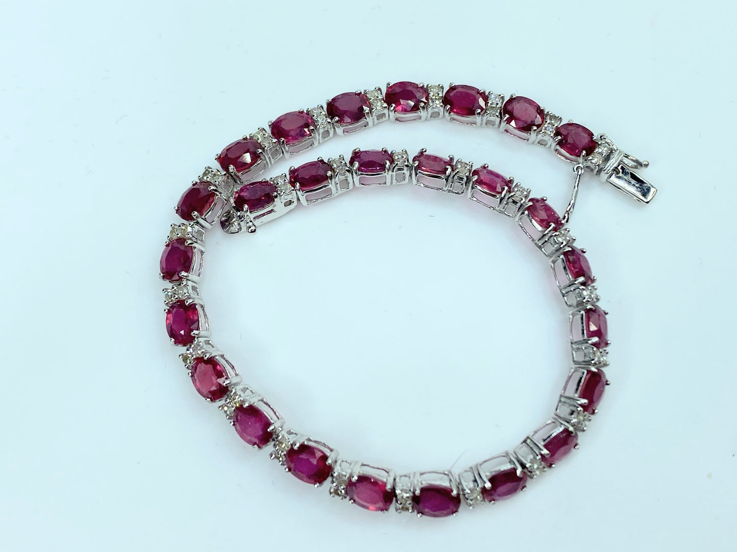 12.0 Carat Ruby Oval and Diamond Tennis Bracelet in 18k White GoldJR9898