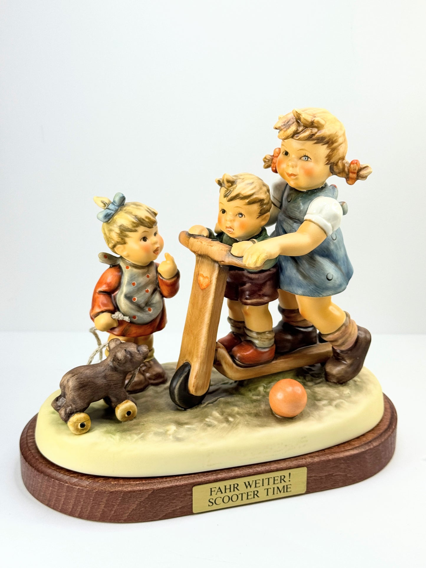 Hummel century collection "Scooter Time" figurine with wood base A629