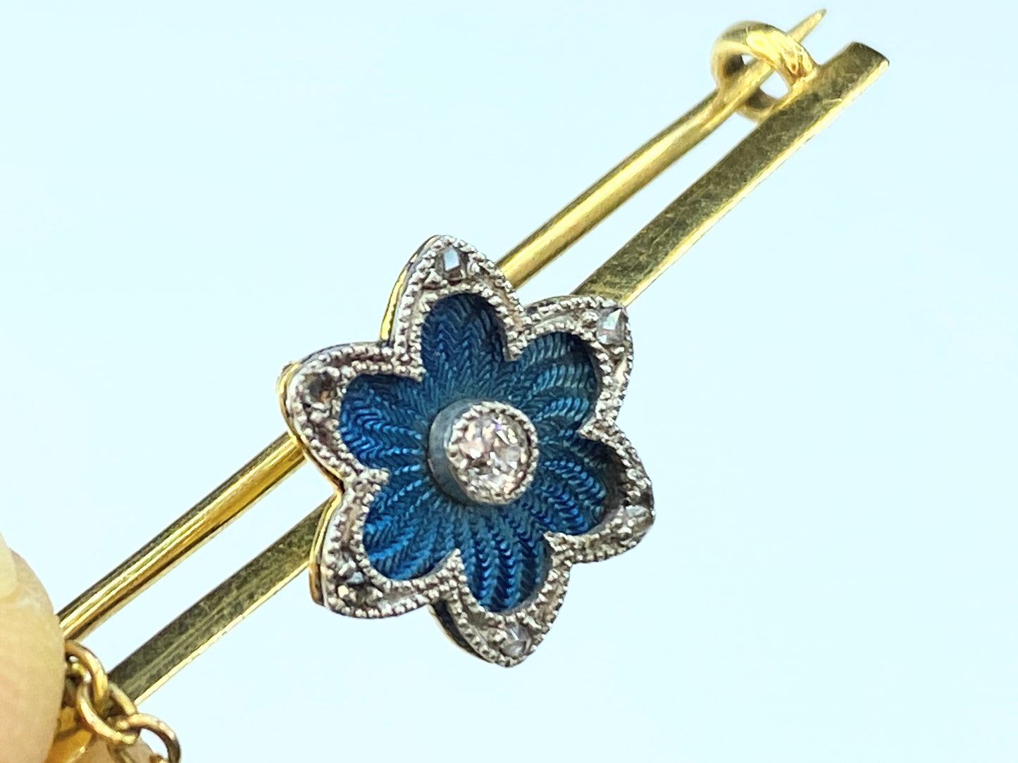 Blue Guilloche blue enamel Floral Diamond bar pin in 18 karat