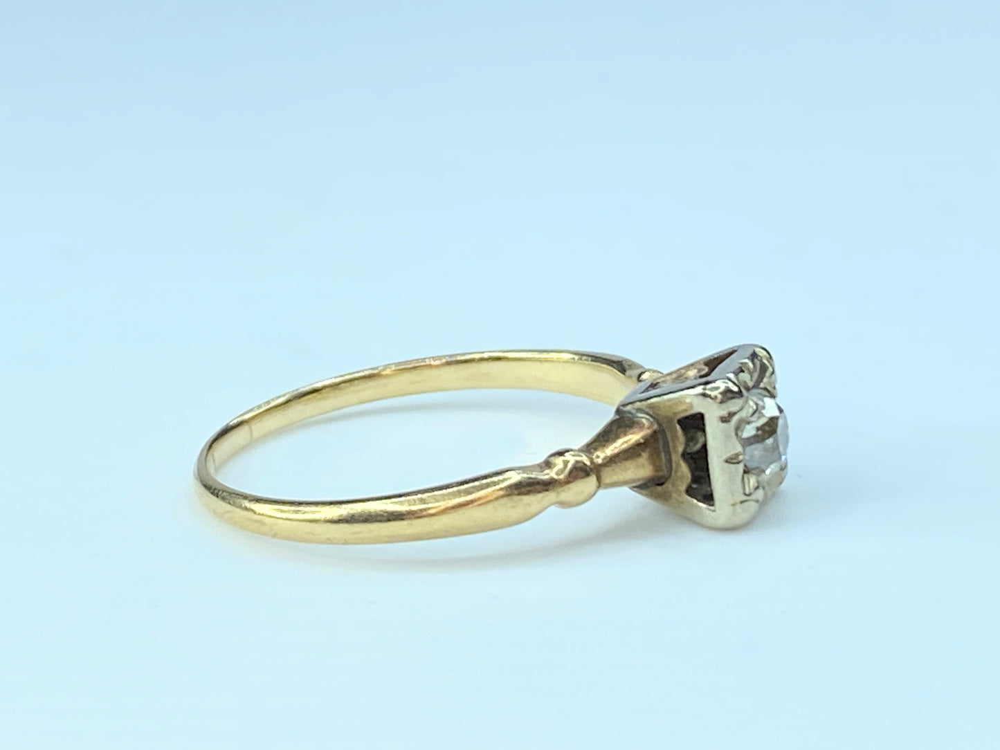 0.25ct Old Euro cut solitaire Diamond ring in bicolor 14K illusion mount