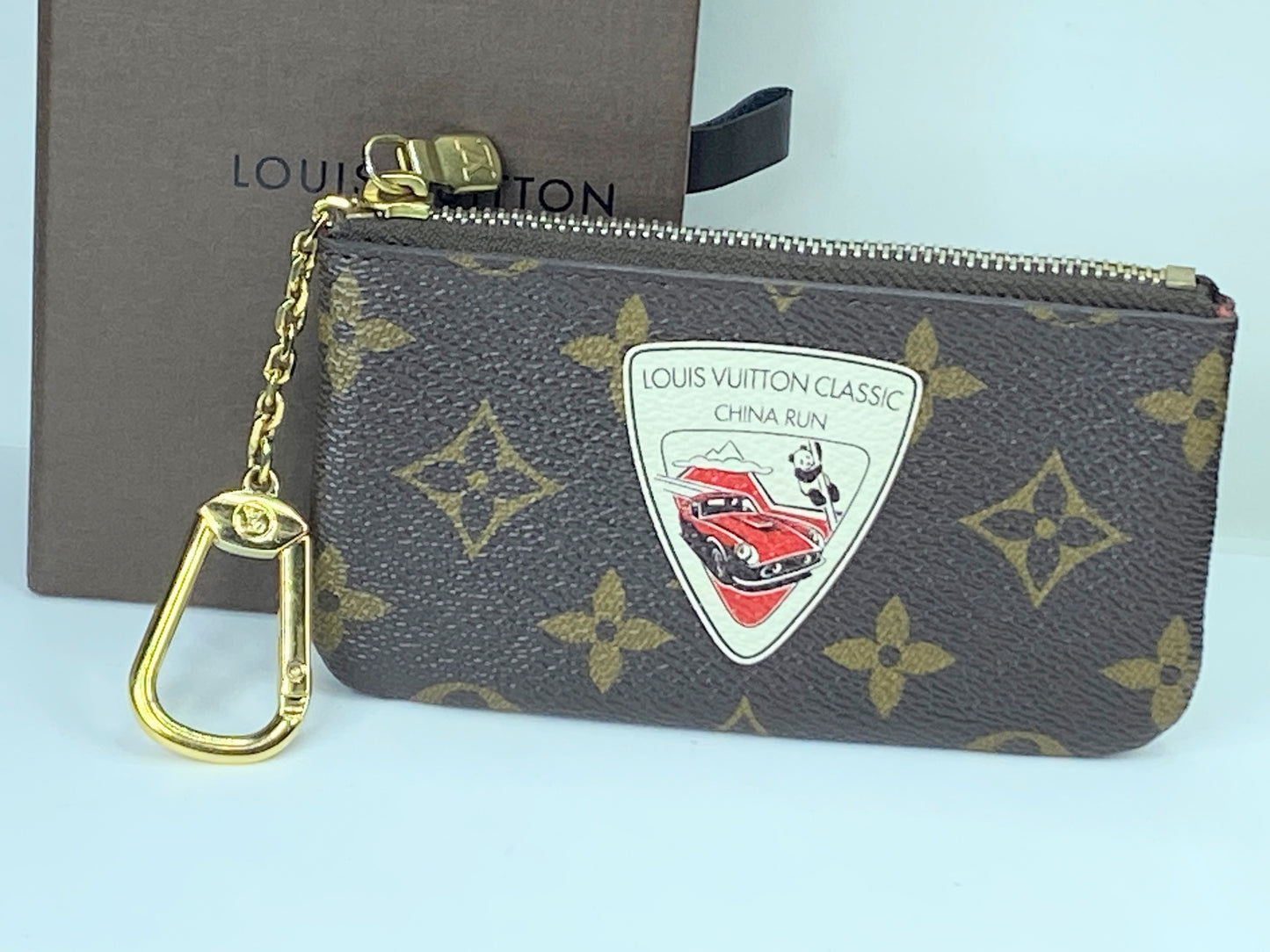 Auth Louis Vuitton Monogram Pochette Cle China Run with box GS420