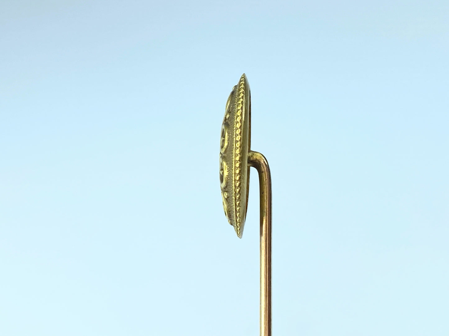 Antique 18 Karat gold stick pin by Day, Clark & Co.