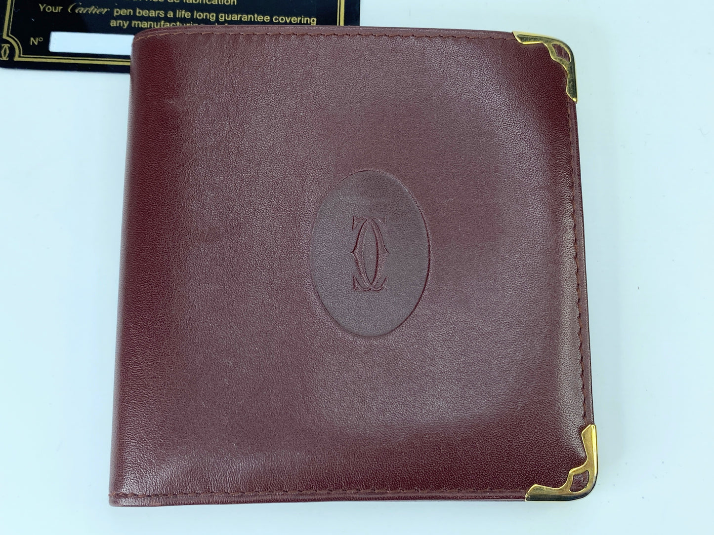 Cartier Bifold Wallet Mastline Bordeaux Leather men's accessory Authentic GS424