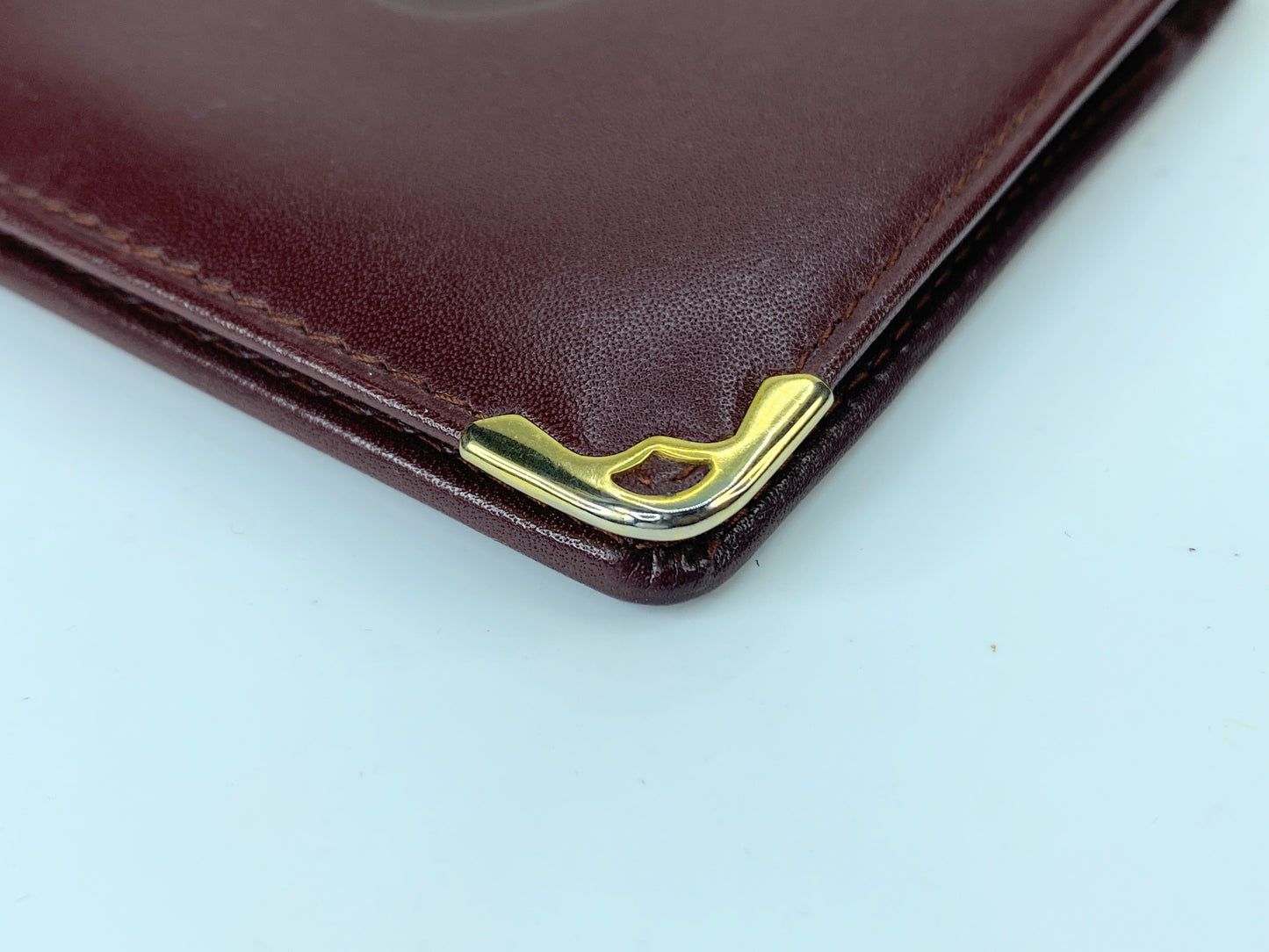 Cartier Bifold Wallet Mastline Bordeaux Leather men's accessory Authentic GS424