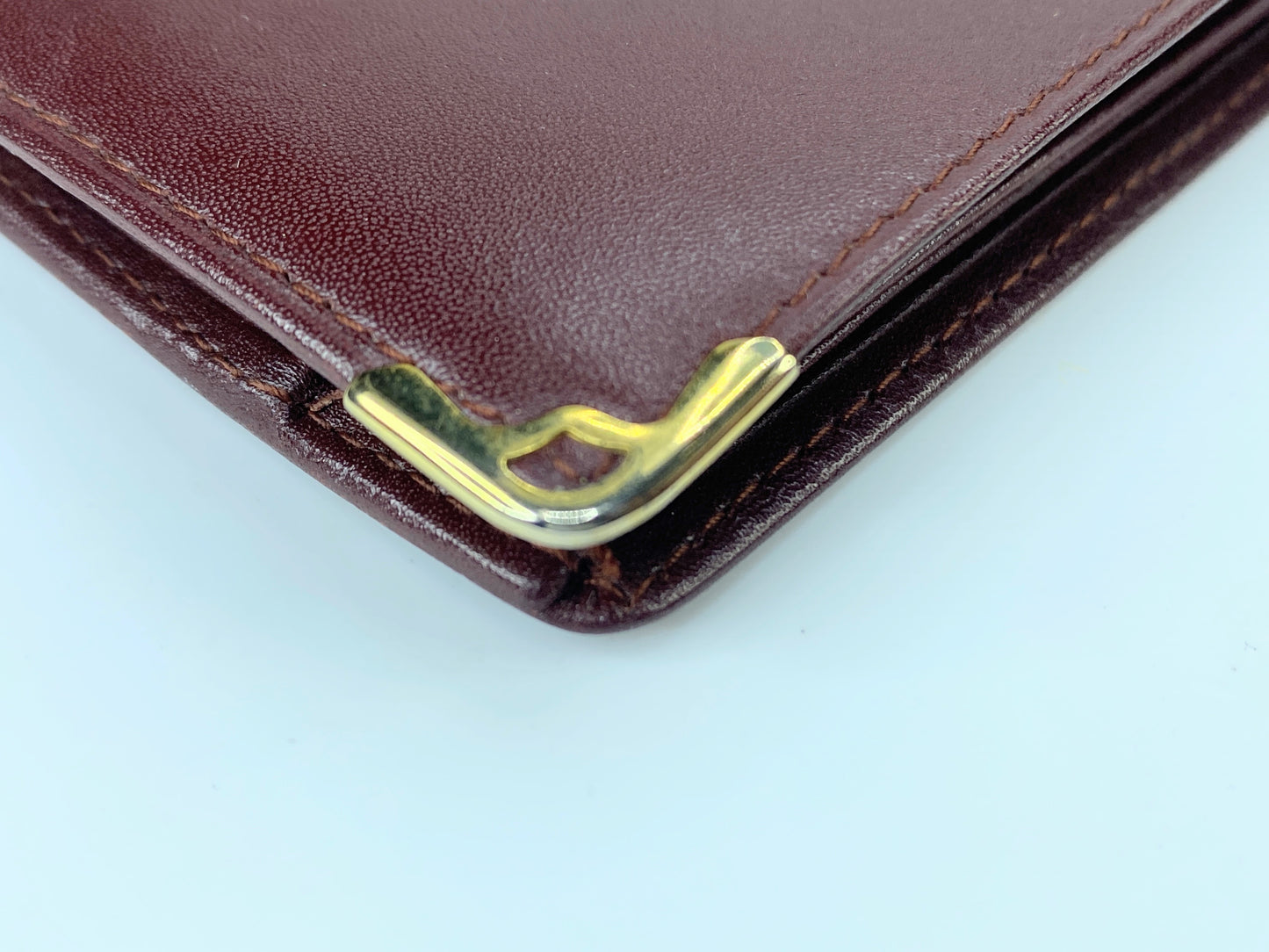 Cartier Bifold Wallet Mastline Bordeaux Leather men's accessory Authentic GS424