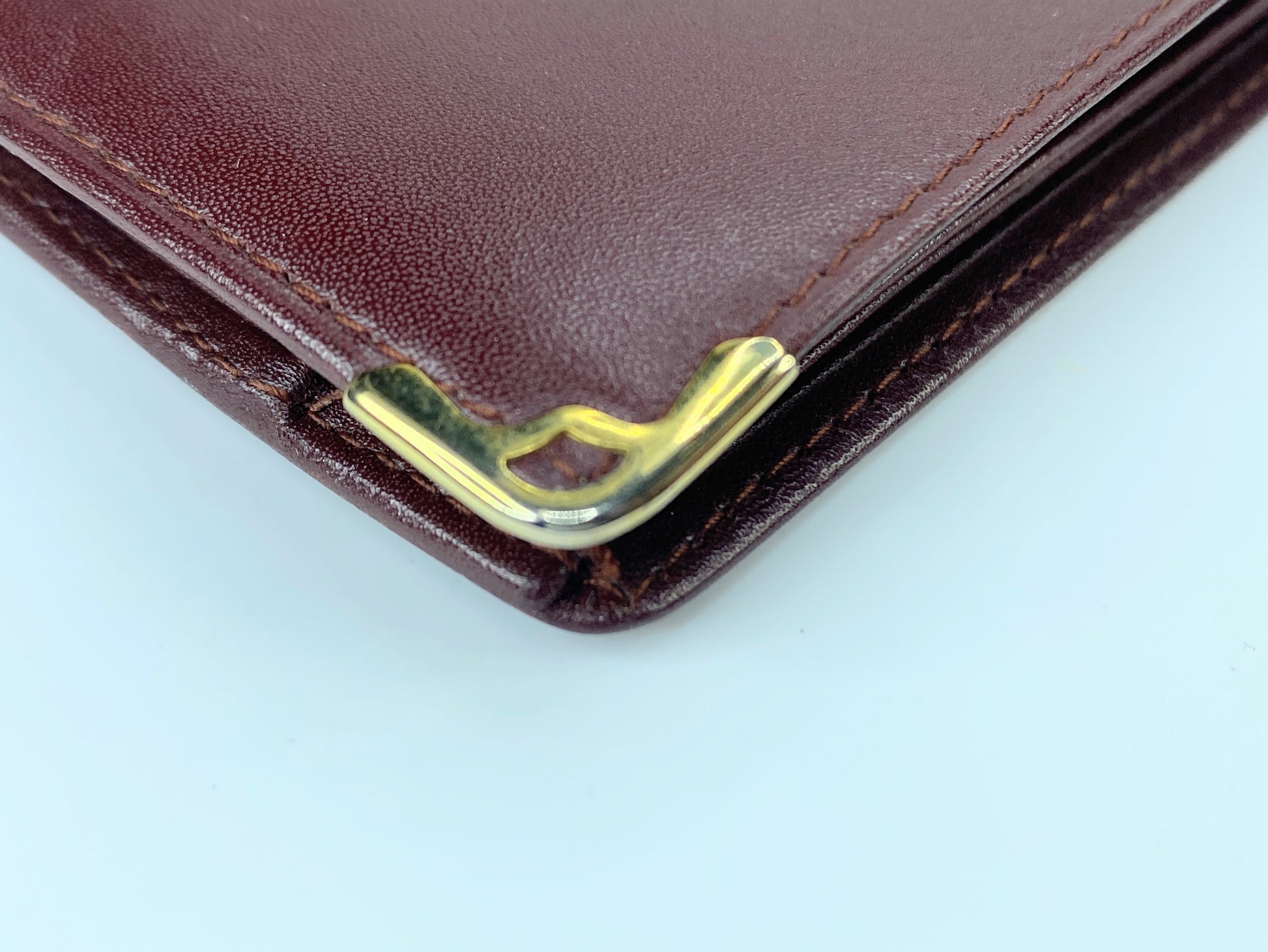 Cartier Bifold Wallet Mastline Bordeaux Leather men's accessory Authentic GS424