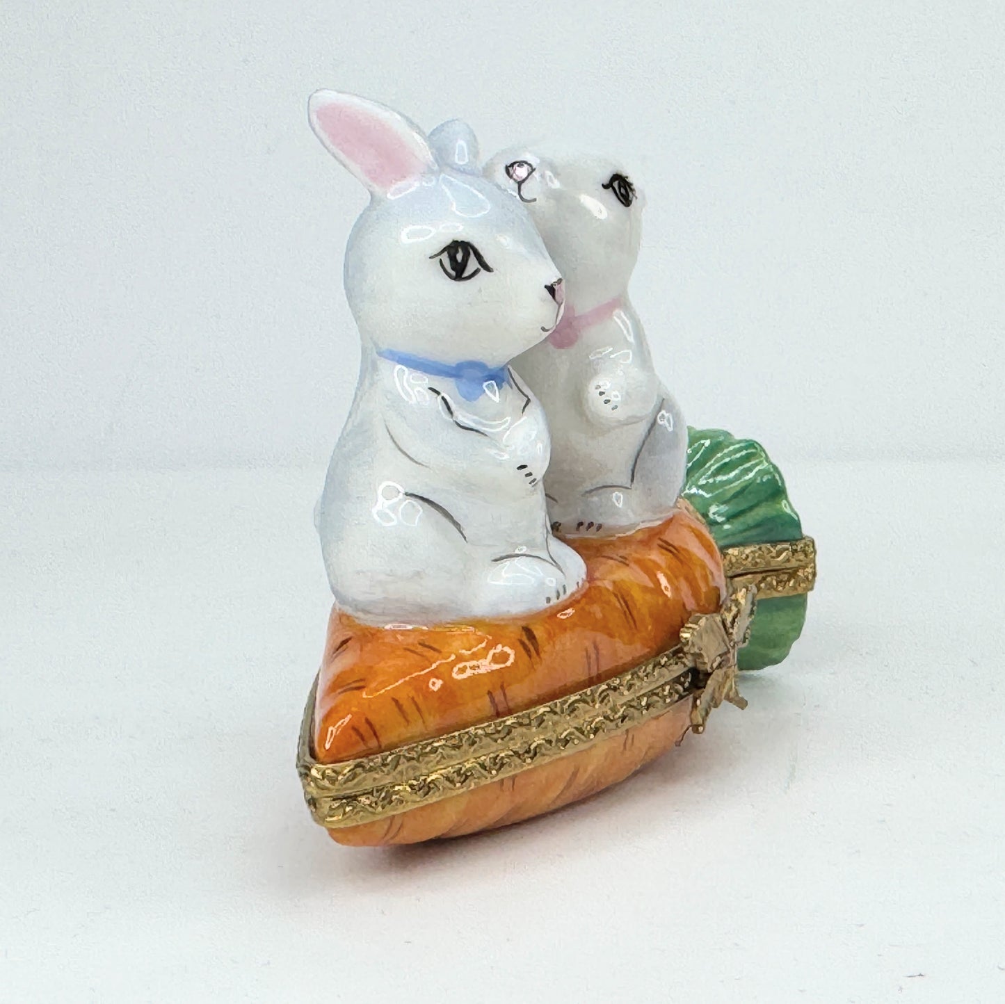 Rochard Limoges Loving Bunny rabbit atop a Carrot Trinket in original box A520