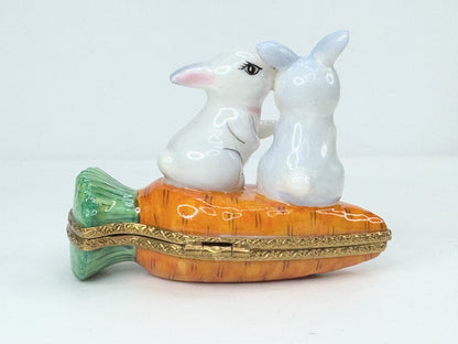 Rochard Limoges Loving Bunny rabbit atop a Carrot Trinket in original box A520