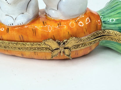 Rochard Limoges Loving Bunny rabbit atop a Carrot Trinket in original box A520