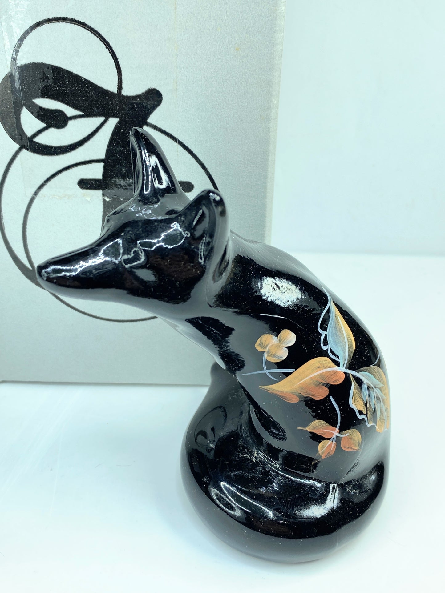 Fenton Art Glass hand-painted black fox figurine in autumn leaves design A587