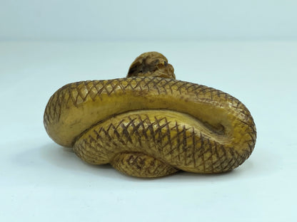 19th century hand carved Resin Snake with a mouse in the mouth Netsuke A588