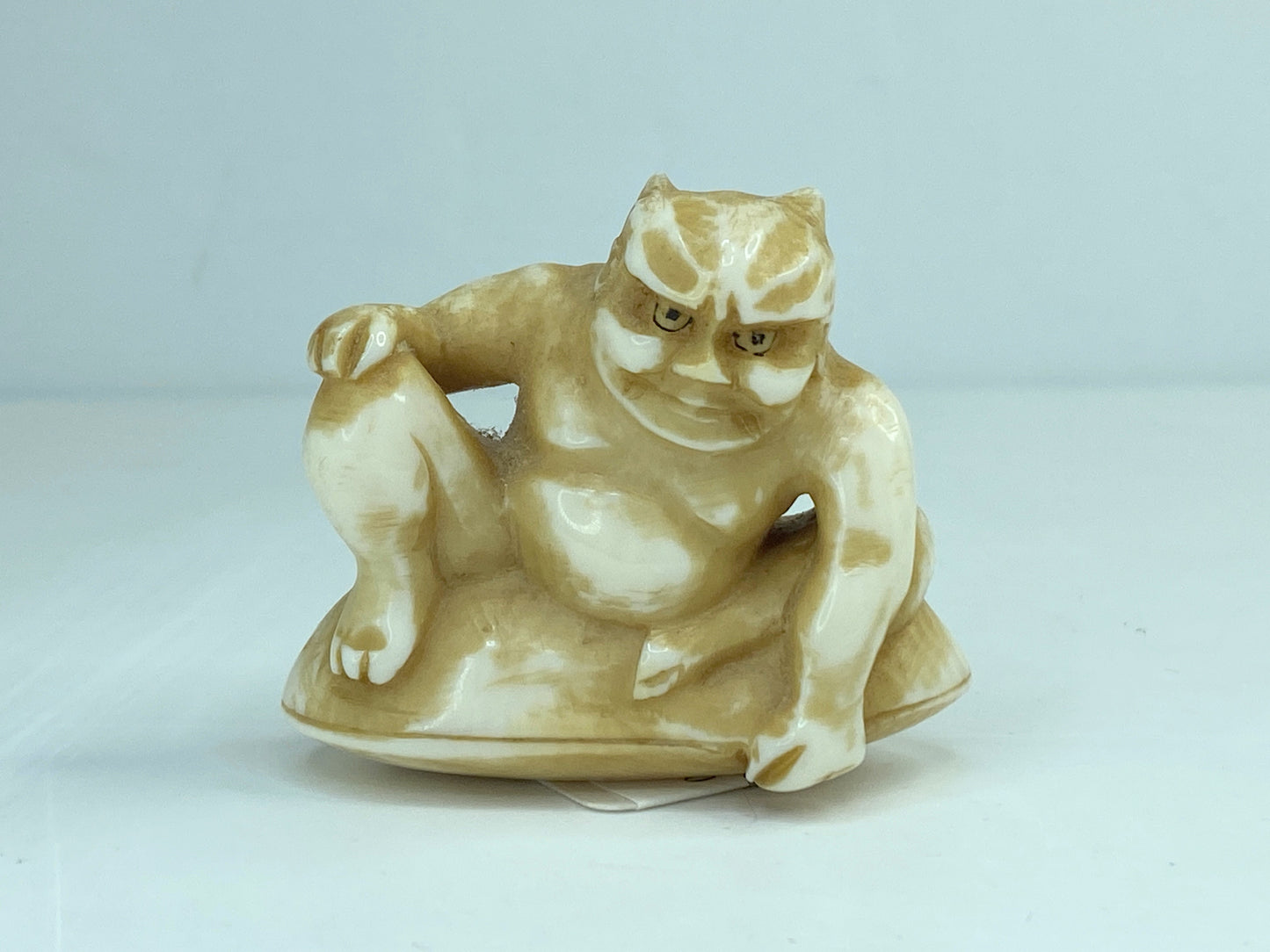 Signed c1920 Hand carved Resin Japanese Netsuke Thunder gold (raiden) A589