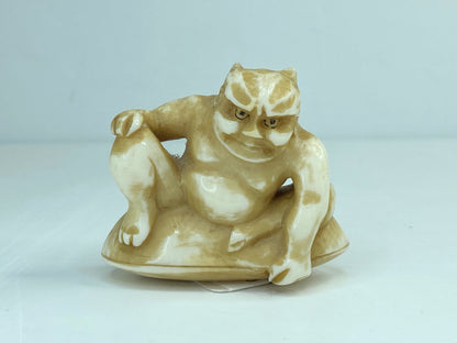 Signed c1920 Hand carved Resin Japanese Netsuke Thunder gold (raiden) A589