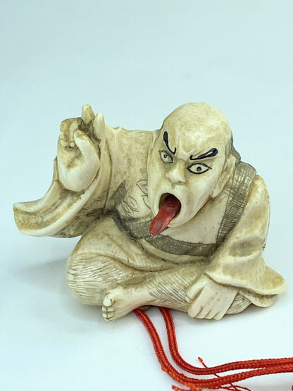 Japanese Netsuke Polychrome carved Sorcery Signed, retractable tongue A593