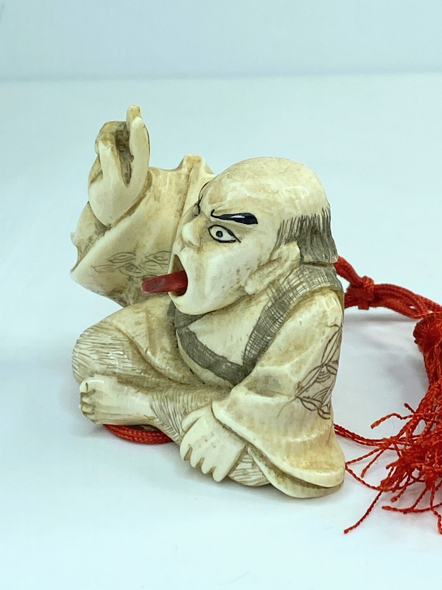 Japanese Netsuke Polychrome carved Sorcery Signed, retractable tongue A593