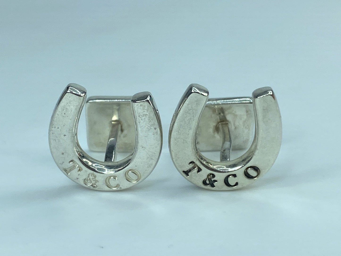 Tiffany & Co, pair of sterling silver lucky horseshoe cufflinks in box JR548