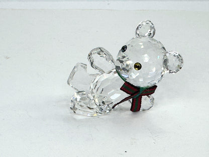 Swarovski Crystal reclining Kris Bear with a red & green scarf S220