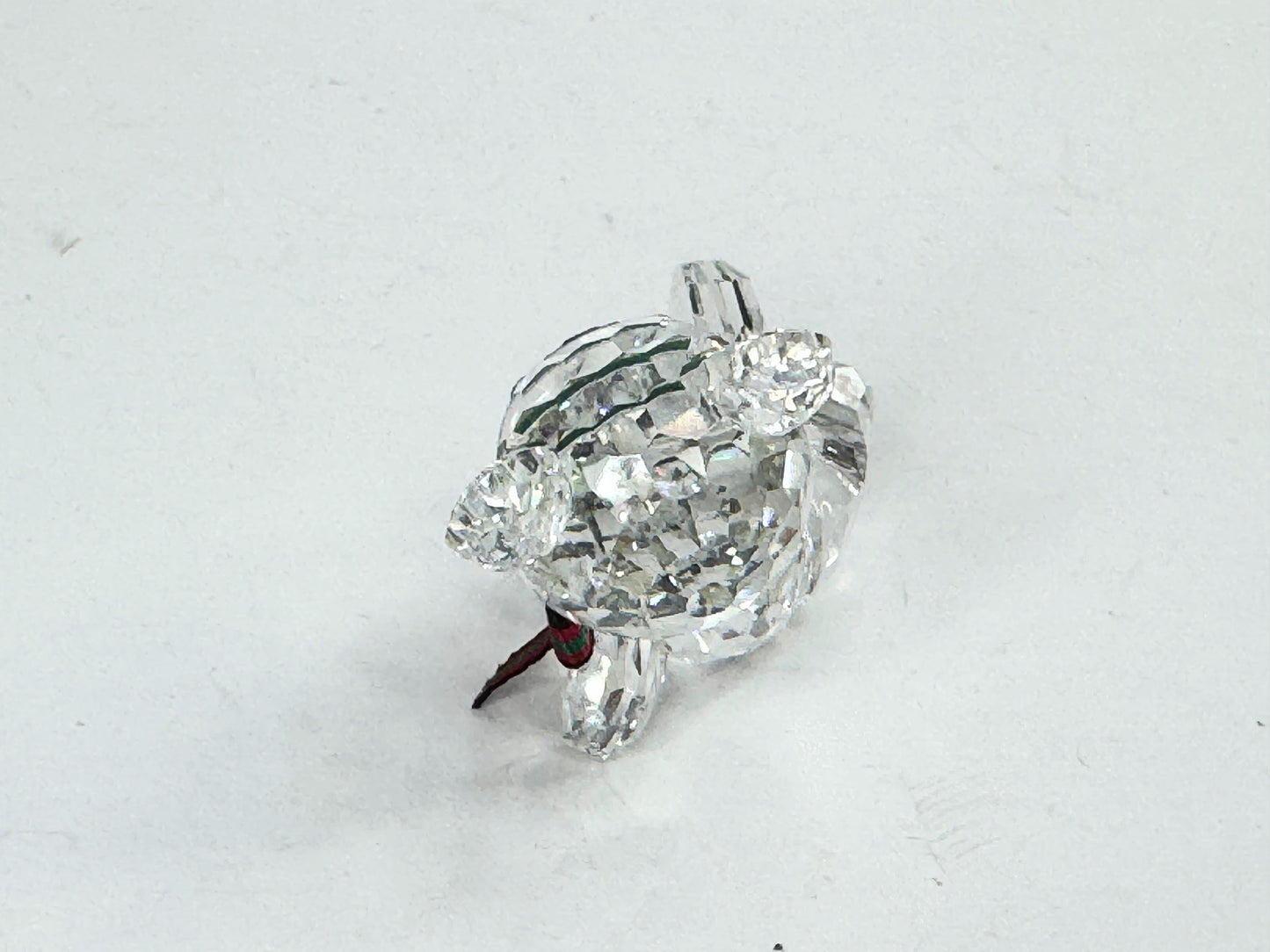 Swarovski Crystal reclining Kris Bear with a red & green scarf S220