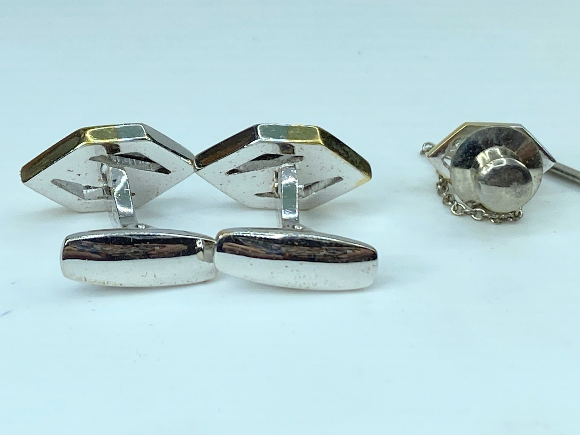 Yves Saint Laurent gold and silver tie pin and cufflinks set in box GS449