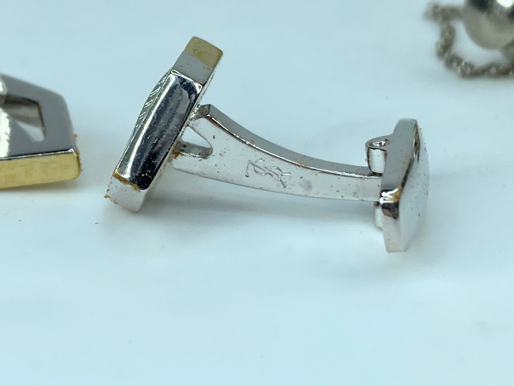 Yves Saint Laurent gold and silver tie pin and cufflinks set in box GS449