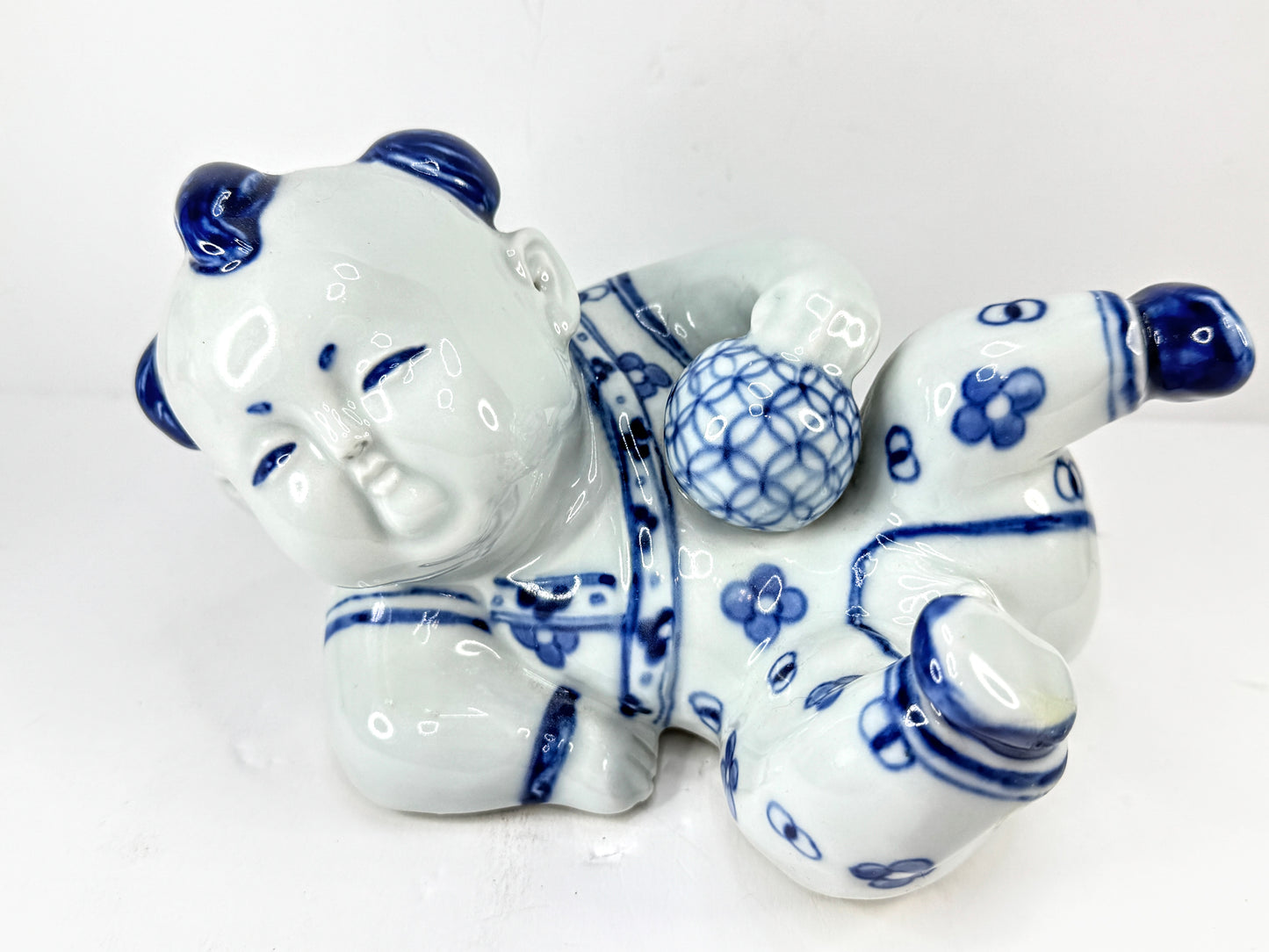 Vintage Blue & White Porcelain Reclining Boy Figurine A1130