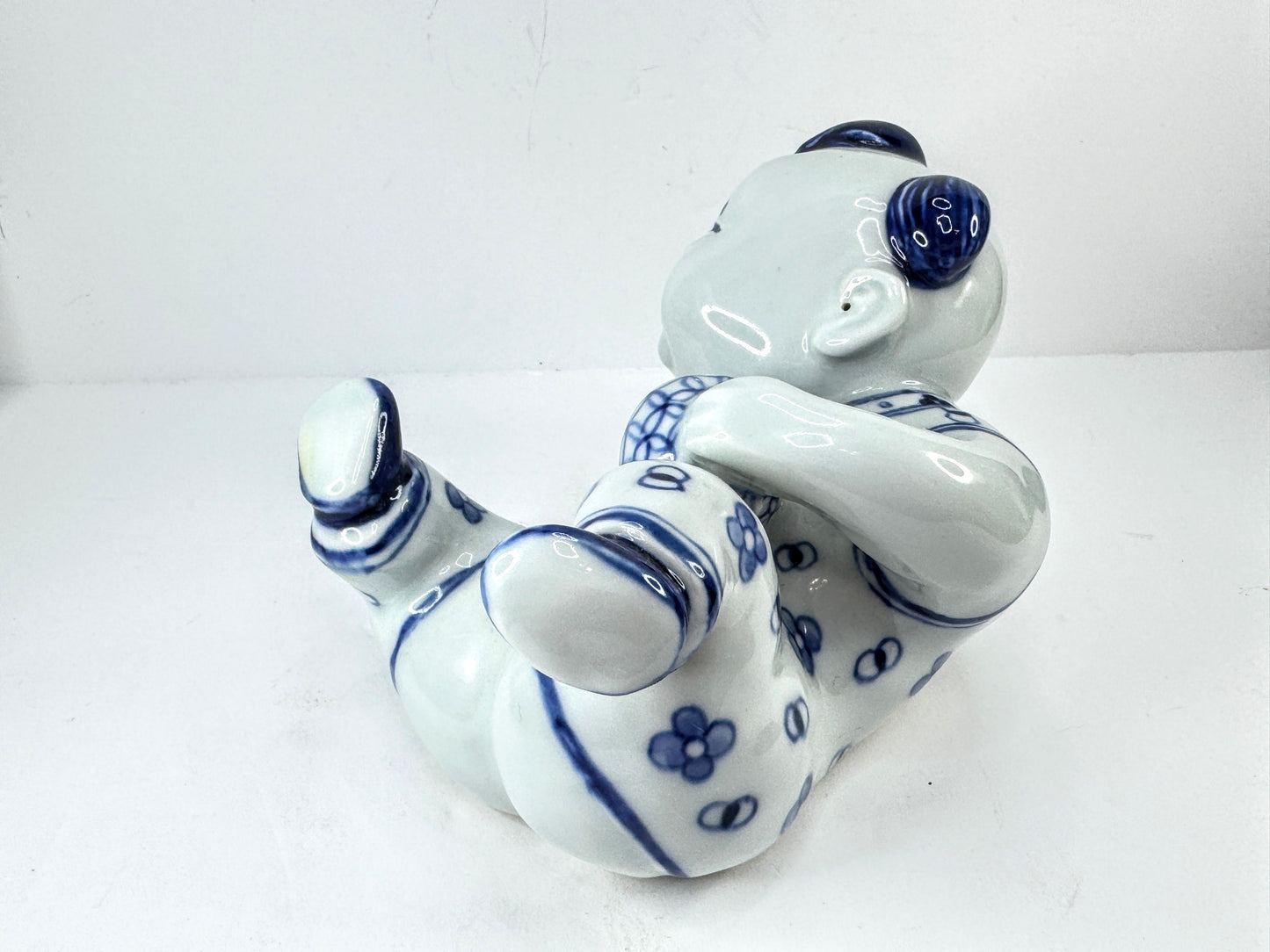 Vintage Blue & White Porcelain Reclining Boy Figurine A1130