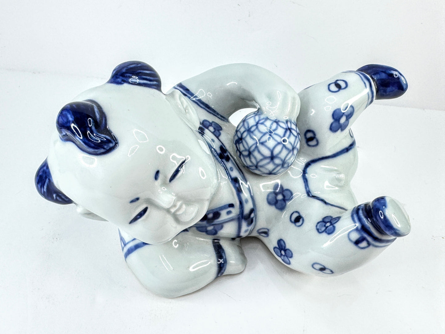Vintage Blue & White Porcelain Reclining Boy Figurine A1130