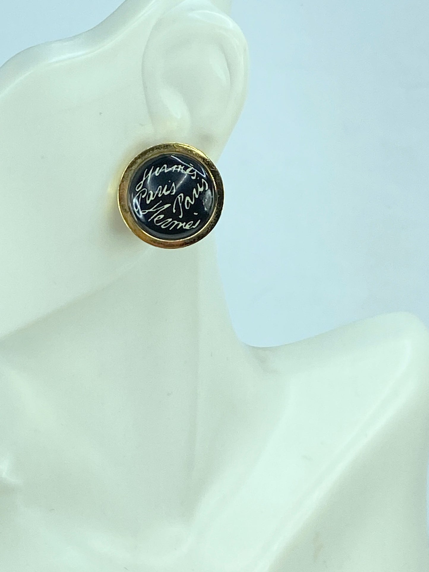 Hermes Gold tone "scribble-scrabble" black round clip on earrings wGS464