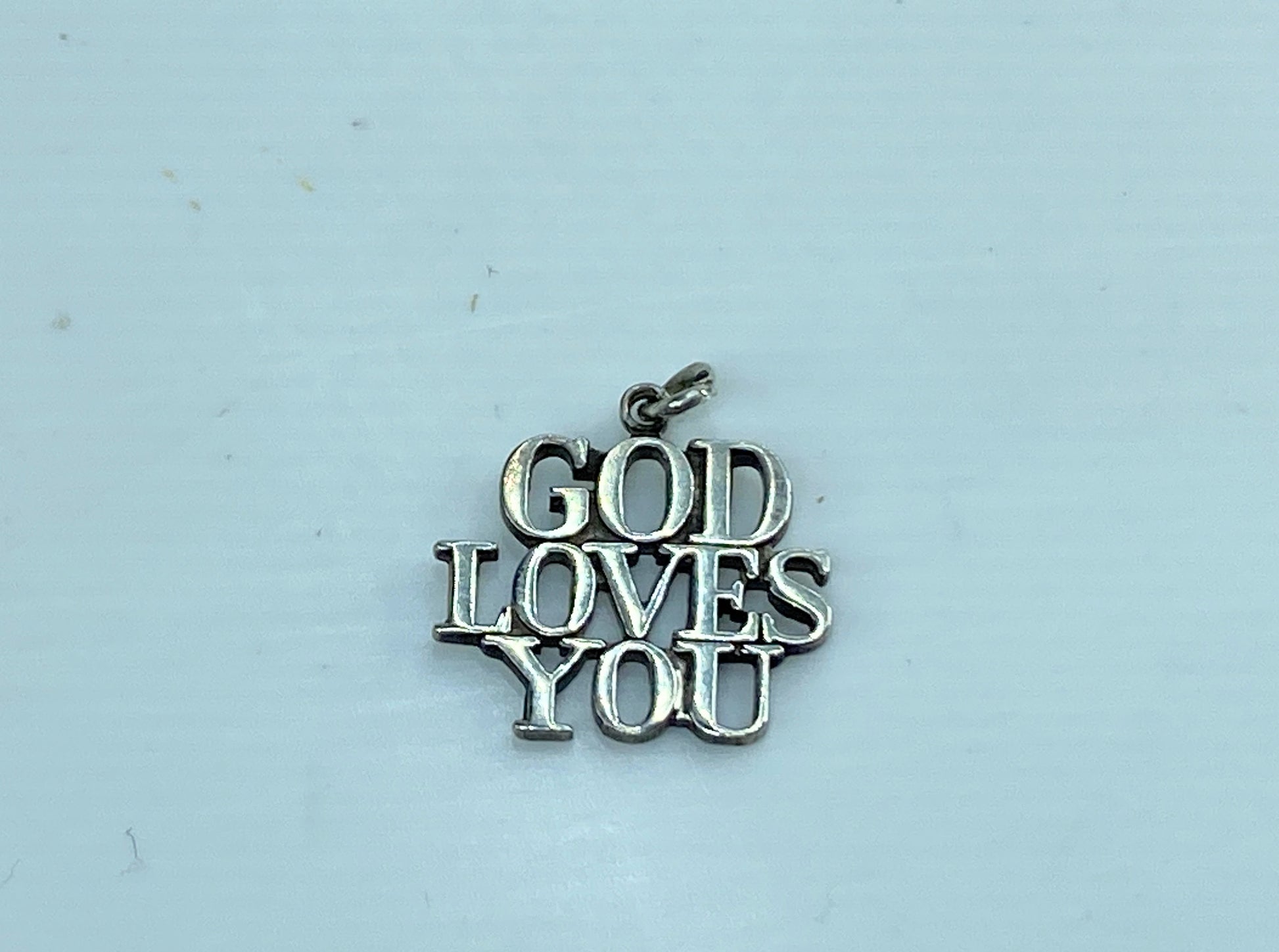 Rare retired Tiffany & Co. GOD LOVES YOU Sterling Silver charm/Pendant JR597