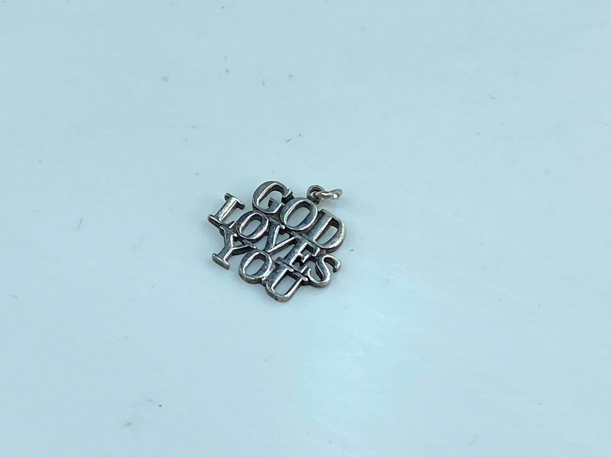 Rare retired Tiffany & Co. GOD LOVES YOU Sterling Silver charm/Pendant JR597