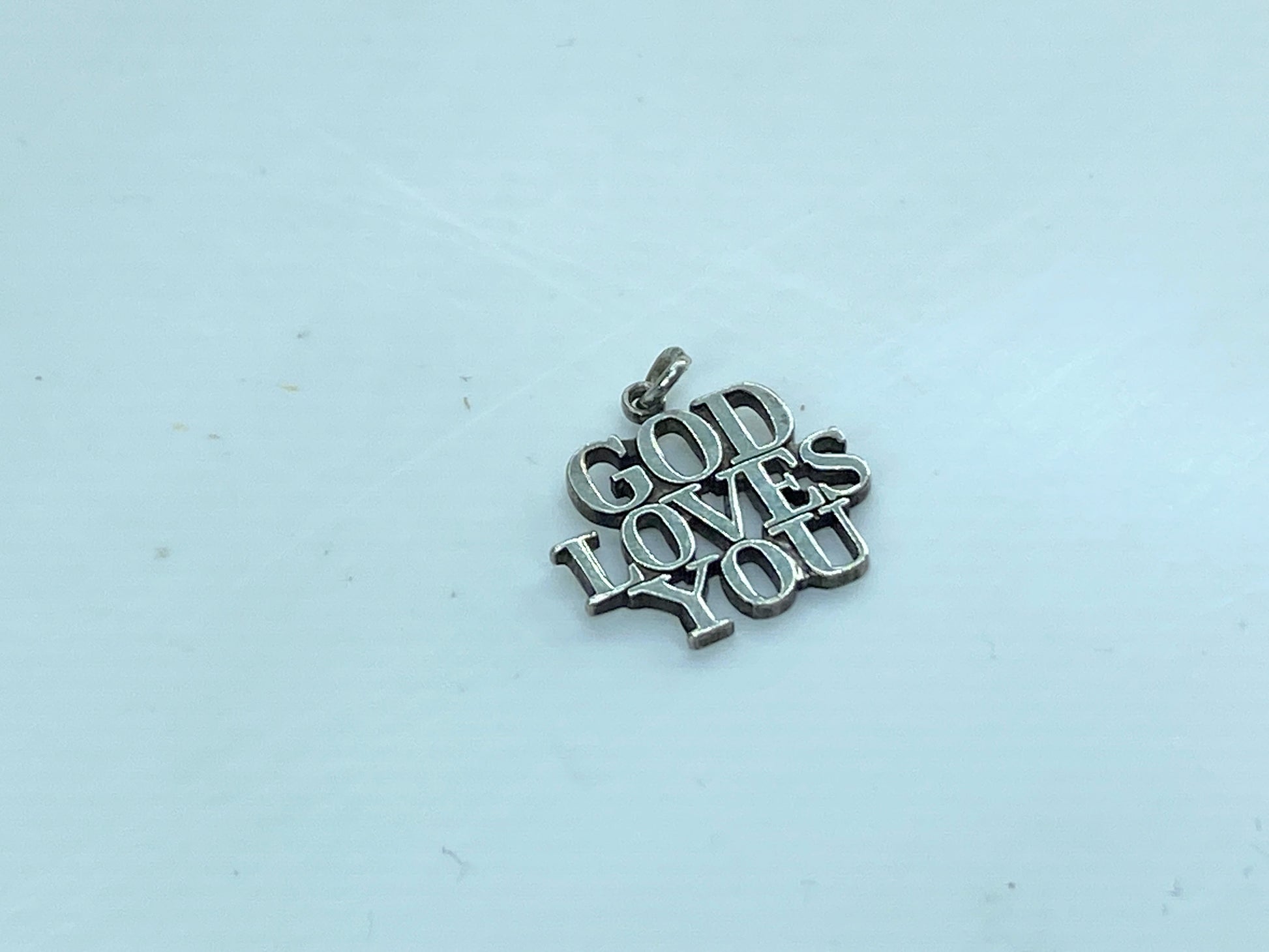 Rare retired Tiffany & Co. GOD LOVES YOU Sterling Silver charm/Pendant JR597