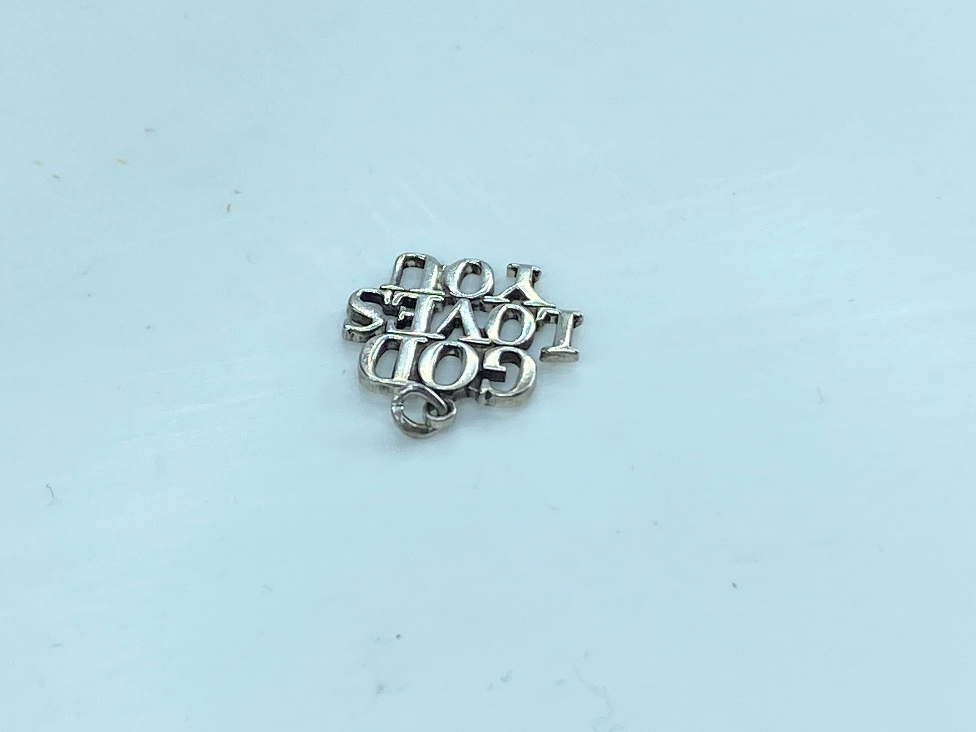 Rare retired Tiffany & Co. GOD LOVES YOU Sterling Silver charm/Pendant JR597