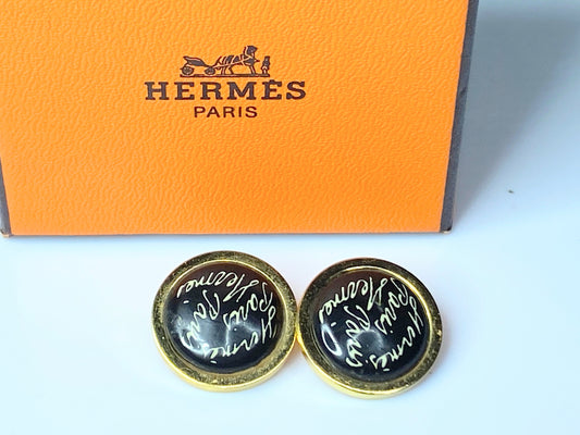 Hermes Gold tone "scribble-scrabble" black round clip on earrings wGS464
